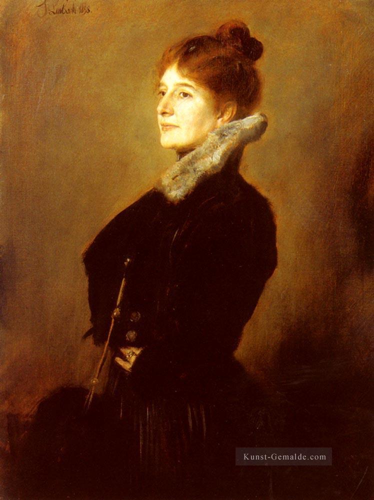 Porträt einer Dame die einen schwarzen Mantel mit Pelzkragen Franz von Lenbach trägt Ölgemälde